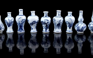 9 porcelain miniature vases with blue and white decor