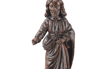 A 17th century carved lime-wood figure of Christ