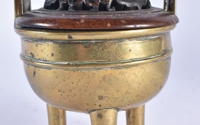 A 19TH CENTURY CHINESE TWIN HANDLED BRONZE QING CENSER, with hardwood cover. 11cm x 9 cm.