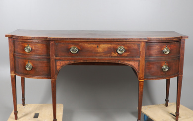 A 19TH CENTURY SHERATON STYLE SHAPED FRONT SIDEBOARD.