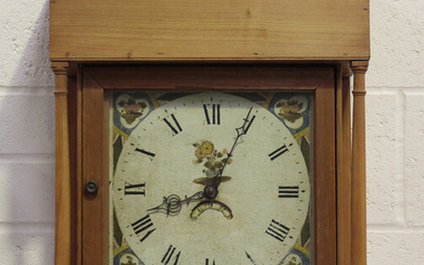 A 19th century pine longcase clock with thirty hour movement striking on a bell via an outside count