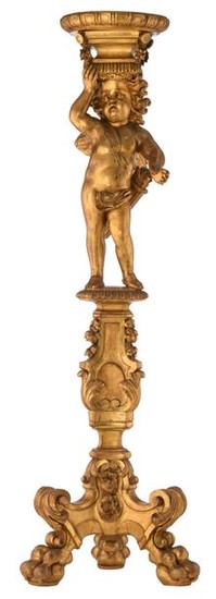 A 19thC Baroque Revival gilt wooden pedestal depicting...
