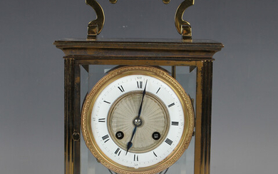 A 20th century gilt lacquered brass four glass mantel clock, the eight day movement with platform es