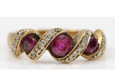 A 9ct gold ruby and brilliant cut diamond dress ring, J, 3gm...
