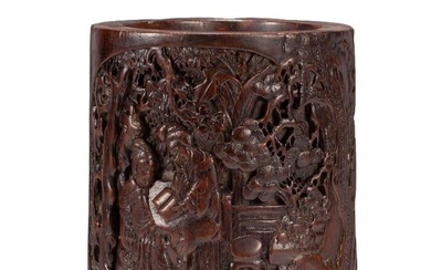 A CARVED ALOES-WOOD FIGURAL STORY BRUSHPOT
