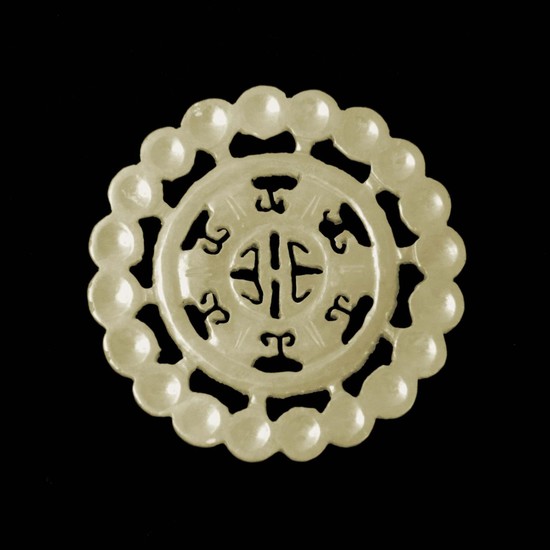 A CHINESE 18th/19th CENTURY Chinese Jade roundel of carved f...