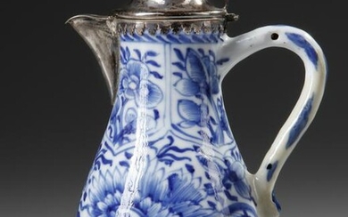 A CHINESE BLUE AND WHITE SILVER MOUNTED MILK JUG