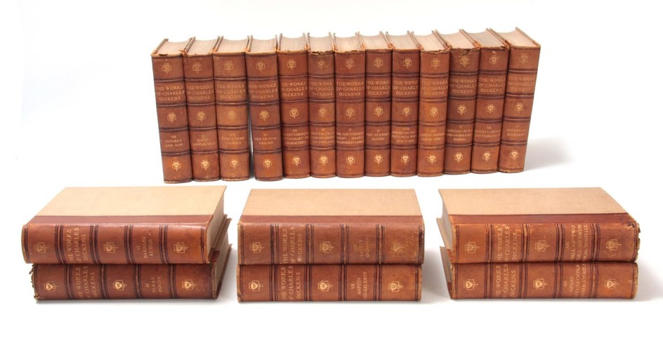 A COLLECTION OF 19 VOLUMES OF THE WORKS OF CHARLES DICKENS i...