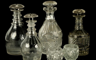 A COLLECTION OF FOUR LATE GEORGIAN CUT GLASS DECANTERS