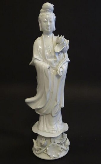 A Chinese blanc de chine figure of Guanyin standing