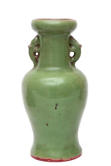 A Chinese celadon baluster vase with rat handles