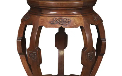 A Chinese hardwood barrel form stool, Republic period The circular top above...