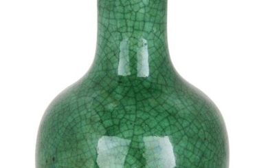 A Chinese porcelain monochrome apple-green crackle-glaze vase, 18th/19th century, covered in a thick apple-green glaze suffused with dark crackles, 12.5cm high