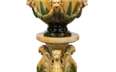 A Clement Massier majolica jardiniere on stand
