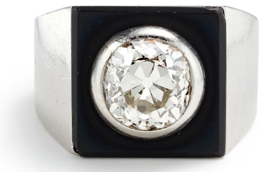 A Diamond, Onyx and Gold Ring