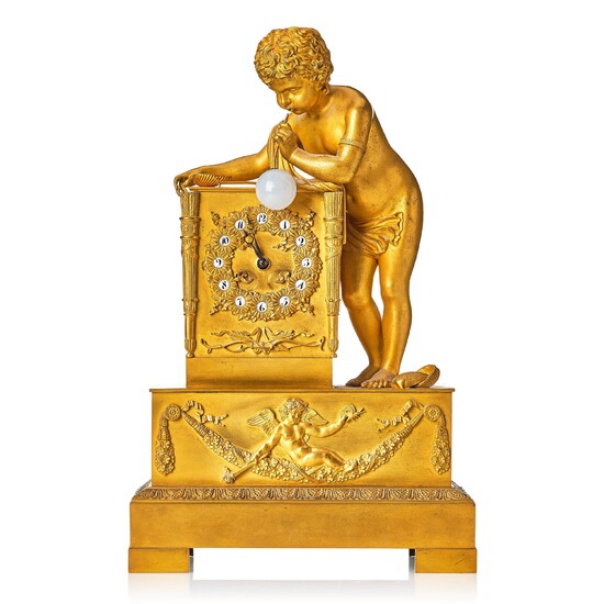 A Empire early 19th century gilt bronze " The Bubble Blower" mantel clock.