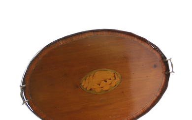 A GEORGE III MAHOGANY SATINWOOD CROSSBANDED BOXWOOD AND EBONY STRUNG OVAL TWO-HANDLED TRAY.