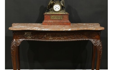 A George II Revival mahogany serpentine serving table, overs...