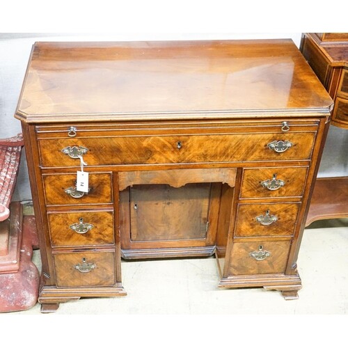 A George II style mahogany kneehole desk, length 92cm, depth...