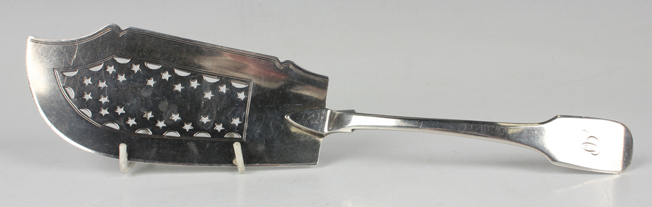 A George III silver Fiddle pattern fish slice with star and crescent pierced decoration, London 1817