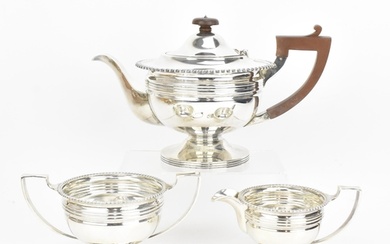 A George V silver three piece tea set by Martin Hall & Co Lt...