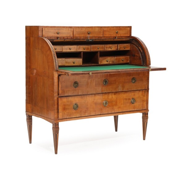 A German Louis XVI walnut and oak roll front bureau, front with five drawers and writing leaf. Late 18th century H. 114. W. 109. D. 57 cm.