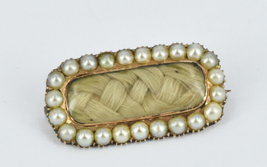 A LATE VICTORIAN MOURNING BROOCH