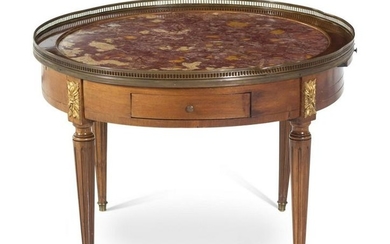 A Louis XVI Style Gilt Metal Mounted Low Table