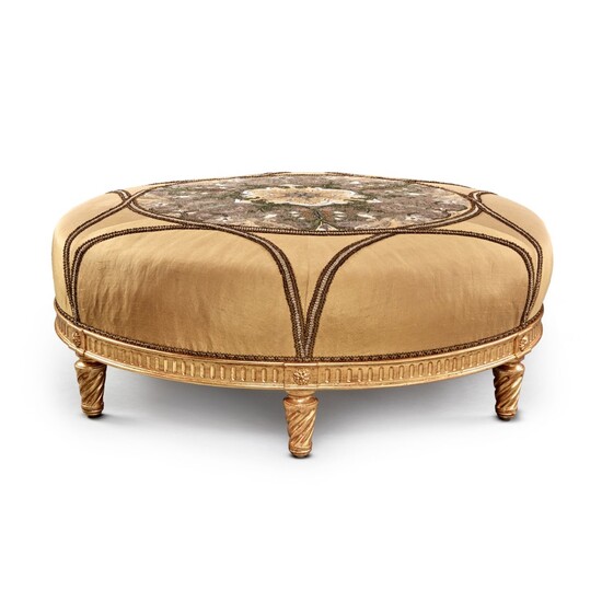 A Louis XVI Style Giltwood Circular Ottoman with a Silk and Embroidery Covering