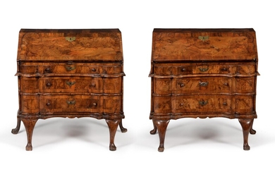 A NEAR PAIR OF SOUTH GERMAN FIGURED WALNUT AND CROSSBANDED BUREAUX, MID 18TH CENTURY