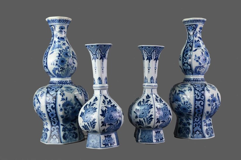 A PAIR OF EARLY 20TH CENTURY DELFT BLUE AND WHITE VASES, ALONG WITH ANOTHER PAIR