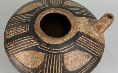A PRE COLUMBIAN VERAGUAS TERRACOTTA AND PIGMENT VESSEL WITH...