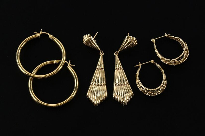 A Pair of 14 Karat Yellow Gold Hoop Earrings.