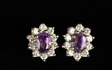 A Pair of Amethyst & Diamond Stud Earrings.