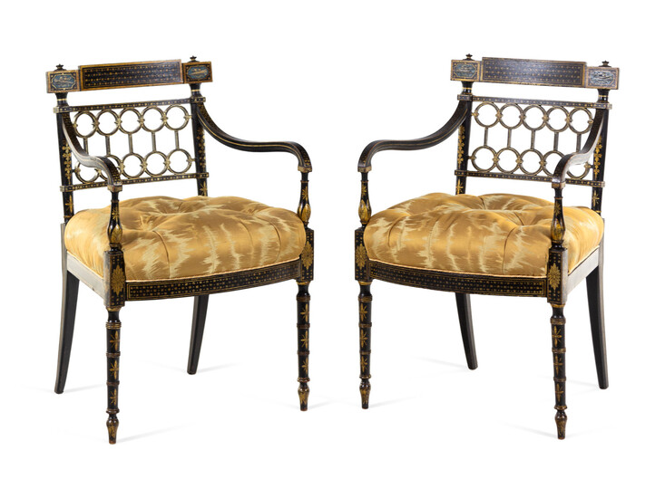 A Pair of Regency Style Gilt and Black Lacquered Armchairs