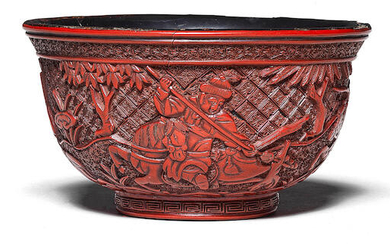 A RARE CARVED CINNABAR LACQUER 'HUNTING SCENE' BOWL