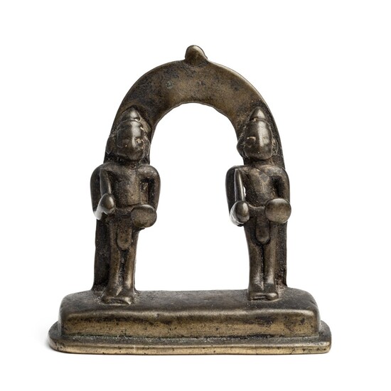 A SMALL BRONZE SHRINE DEPICTING TWO WARRIORS