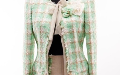 A SUIT BY CHANEL