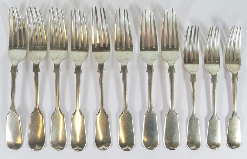 A Set of Eight Victorian Silver Forks and three desert forks...