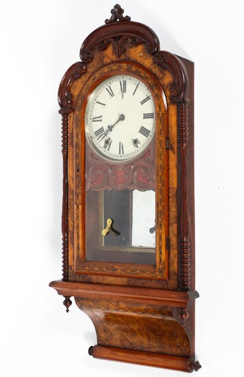 A Seth Thomas burr walnut striking wall clock, inlaid with stringing
