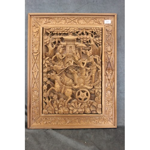 A Thai carved wood panel, depicting dancers, and a phoenix o...