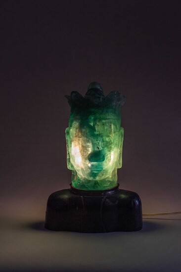 A VERY LARGE GREEN AMETHYST HEAD OF GUANYIN MOUNTED AS A LAMP