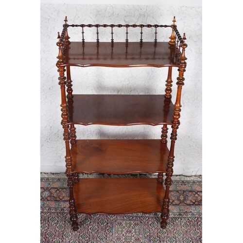 A VICTORIAN MAHOGANY FOUR TIER WHATNOT with spindle gallery ...