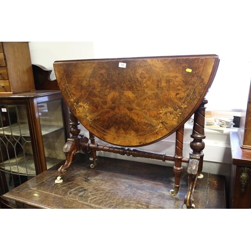 A Victorian burr walnut and inlaid oval Sutherland tea table...
