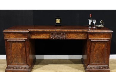 A William IV mahogany sideboard, inverted break-centre top a...