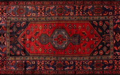 A Zanjan hand knotted wool rug, 4’2 1/2” x 7’ 5 1/2”