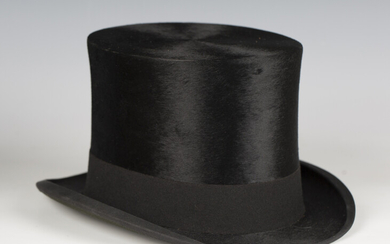 A black silk top hat by G.A. Dunn & Co of London, head circumference 56cm.