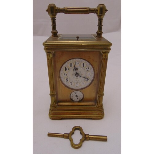 A brass repeating carriage clock by Dent of the Strand, rect...