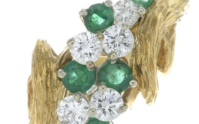 A brilliant-cut diamond and circular-shape emerald