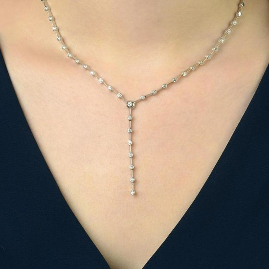 A brilliant-cut diamond collet necklace.Estimated total